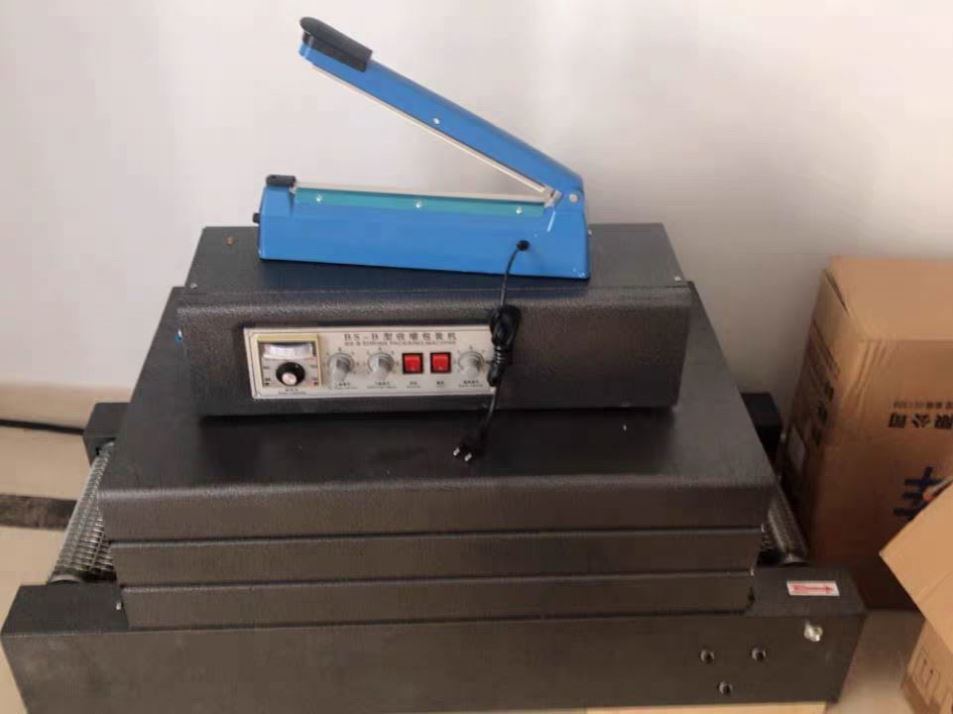 فروش داغ فلمی پلاستیکی کوچک تونل گرما کوچک برش بسته بندی ماشین برای بطری / جعبه آسان کار